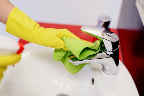 Carpet cleaning team preparing equipment with safety awareness
