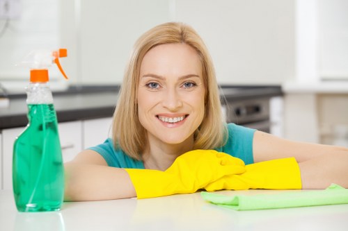 Technician inspecting the work area for hazards before cleaning